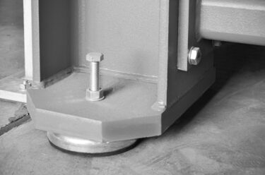 Close-up of the base of a WEIMA shredder with leveling mechanism