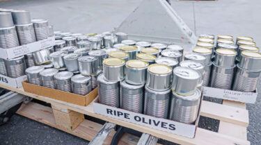 Canned food tins on a pallet